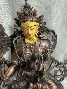 Green Tara sitting position