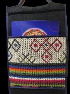 Handwoven hanging magazine rack